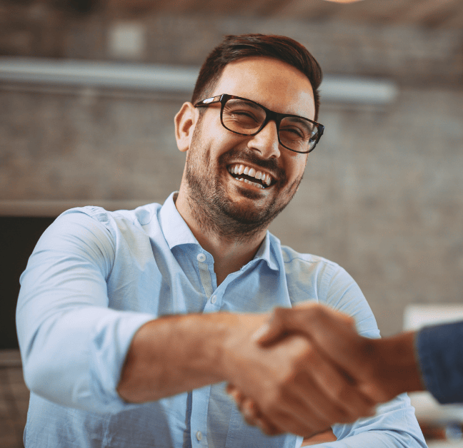 A Professional Man Shaking Hands with a Client